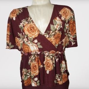 Beautiful Floral top Xl and fits a large